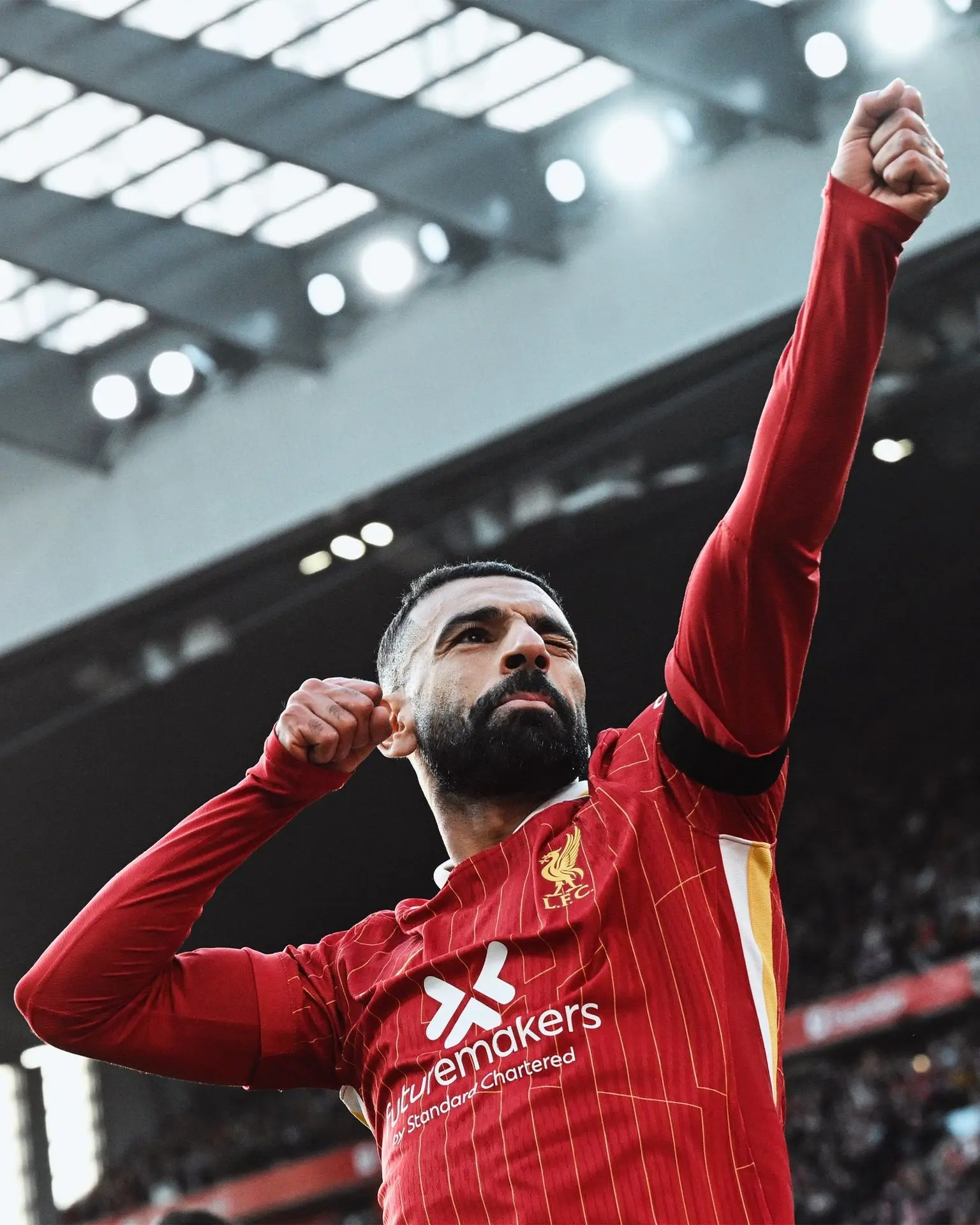 Salah celebrates scoring vs Chelsea at Anfield